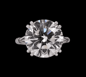 9.92CT ROUND BRILLIANT, K, SI1 set in Platinum ring with 2 Baguette side diamonds = 0.67cttw